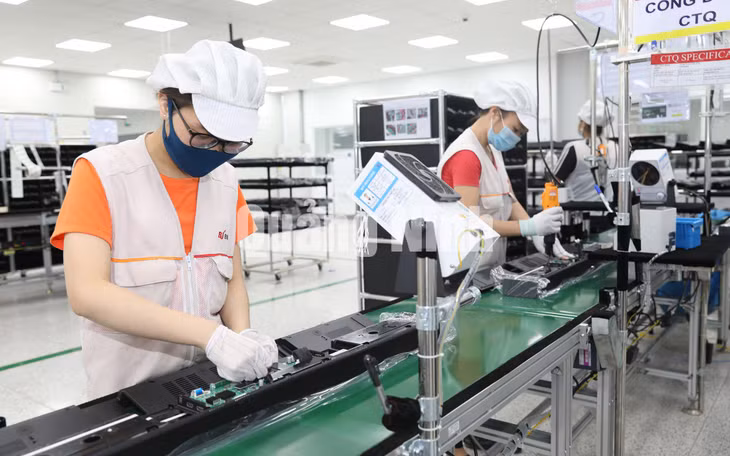 Nhà máy Bumjin Electronics sản xuất bộ thu AV, sản phẩm điện tử dân dụng (1-2021). Ảnh: Đỗ Phương