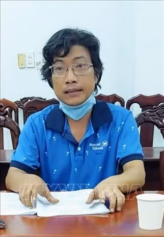 Đối tượng Võ Hoàng Thơ tại cơ quan công an. Ảnh: TTXVN phát