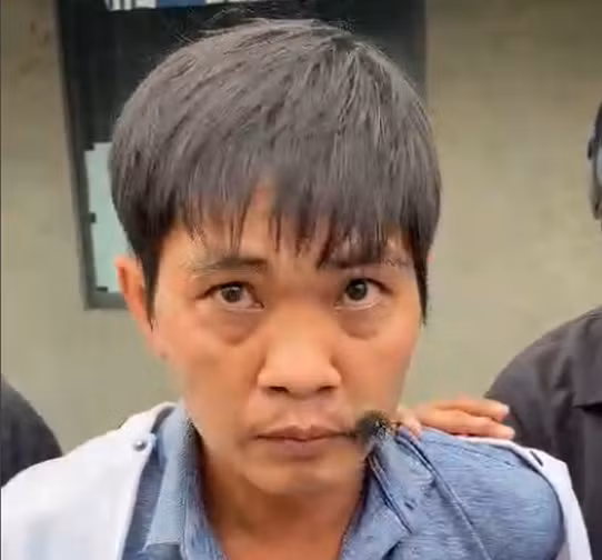 Đối tượng Lê Thành Bình sau khi bị bắt giữ.