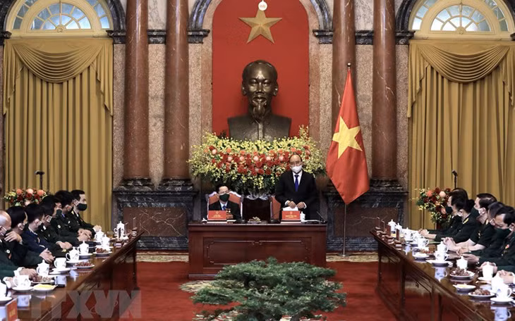 Chủ tịch nước Nguyễn Xuân Phúc ghi nhận những nỗ lực của các doanh nghiệp, doanh nhân cựu chiến binh trong sản xuất kinh doanh, đóng góp vào các hoạt động xã hội. (Ảnh: Lâm Khánh/TTXVN)