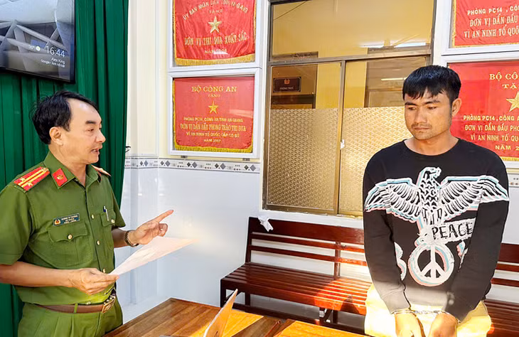 Phan Văn Triết tại cơ quan công an. Ảnh: T.T