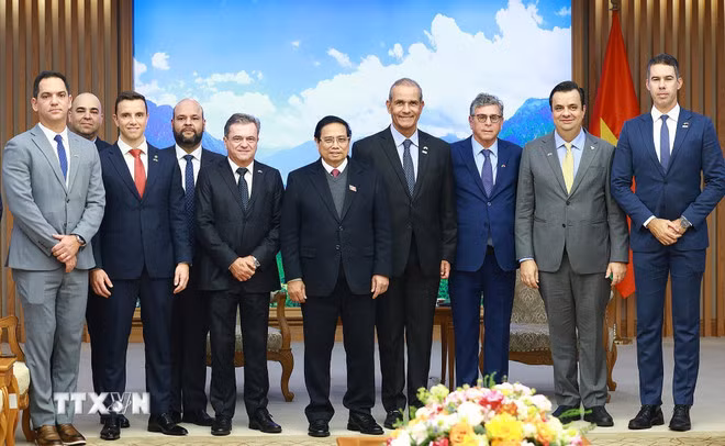 Thủ tướng Phạm Minh Chính tiếp ông Renato Costa, Chủ tịch Công ty Friboi thuộc Tập đoàn cung ứng thịt JBS SA của Brazil. (Ảnh: Dương Giang/TTXVN)