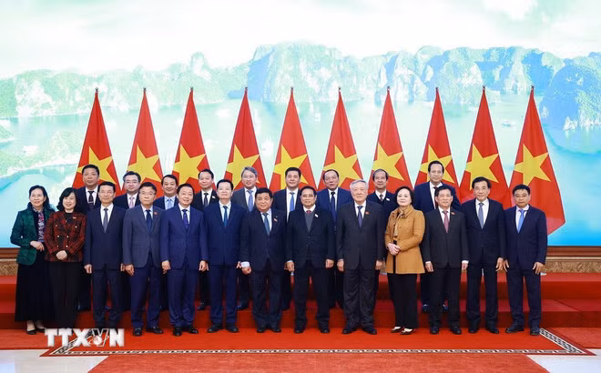 Thủ tướng Phạm Minh Chính với các thành viên Chính phủ. (Ảnh: Dương Giang/TTXVN)