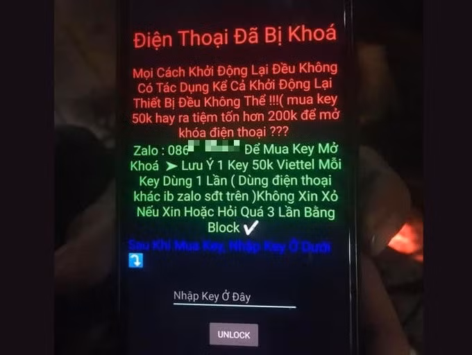 Thông báo của ứng dụng tống tiền khi chiếm quyền kiểm soát màn hình smartphone (Ảnh: AnonyViet).