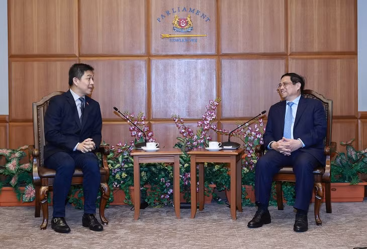 Thủ tướng Chính phủ Phạm Minh Chính hội kiến Chủ tịch Quốc hội Singapore Tan Chuan-Jin. (Ảnh: Dương Giang/TTXVN)