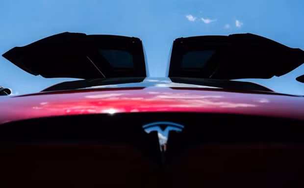 Sieu may tinh AI nang gia tri von hoa Tesla len hon 1.200 ty USD hinh anh 1