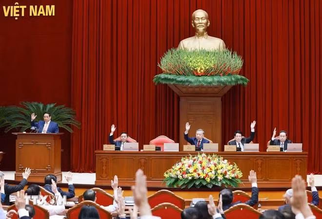 Các đại biểu biểu quyết thông qua chương trình hội nghị. (Ảnh: Thống Nhất/ TTXVN)
