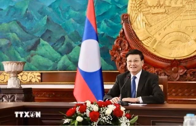 Tổng Bí thư, Chủ tịch nước Lào Thongloun Sisoulith hội đàm trực tuyến với Chủ tịch nước Lương Cường. (Ảnh: Xuân Tú/TTXVN)
