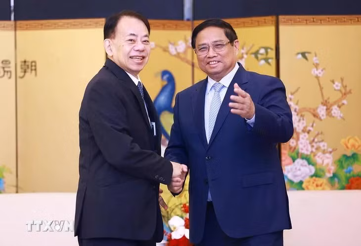 Thủ tướng Phạm Minh Chính tiếp ông Asakawa Masatsugu, Chủ tịch Ngân hàng Phát triển châu Á (ADB). (Ảnh: Dương Giang/TTXVN)