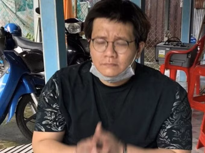 Nhâm Hoàng Khang lúc bị bắt. Ảnh: Nhật Vy