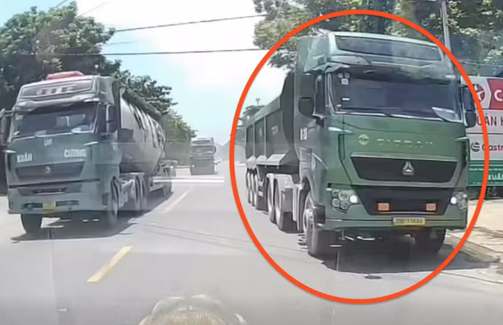 Tài xế xe tải vượt ẩu bị xử phạt.