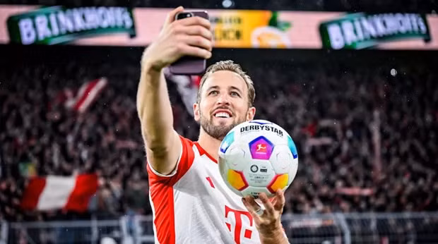 Bundesliga: Kane lap ky luc, gop cong giup Bayern vui dap Dortmund hinh anh 3