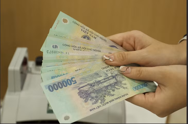Tỉ lệ nợ xấu mới hình thành của các ngân hàng được dự báo sẽ chậm lại, do khả năng trả nợ của khách hàng sẽ dần được cải thiện - Ảnh: CƯỜNG NGÔ