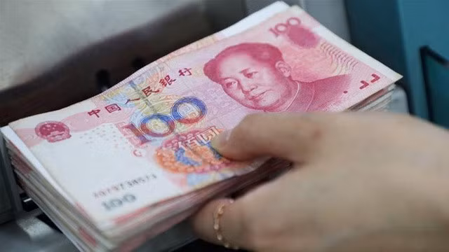 Đồng Nhân dân tệ giao dịch xuyên biên giới lập kỷ lục - Ảnh 1.