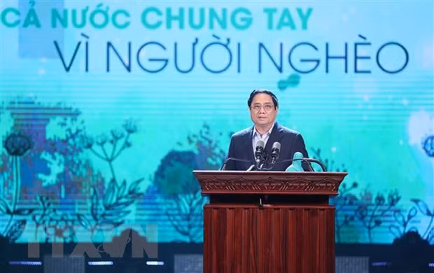 Thủ tướng Phạm Minh Chính phát biểu, vận động ủng hộ giúp đỡ người nghèo nhân Tháng cao điểm "Vì người nghèo" năm 2022. (Ảnh: Dương Giang/TTXVN)