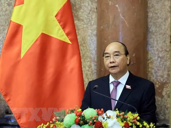 Chu tich nuoc Nguyen Xuan Phuc len duong tham huu nghi chinh thuc Lao hinh anh 1