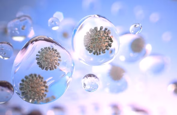 Biến thể Delta lây truyền từ người sang người thông qua các giọt bắn siêu nhỏ chứa virus bay lơ lửng trong không khí. Ảnh minh hoạ: Getty Images