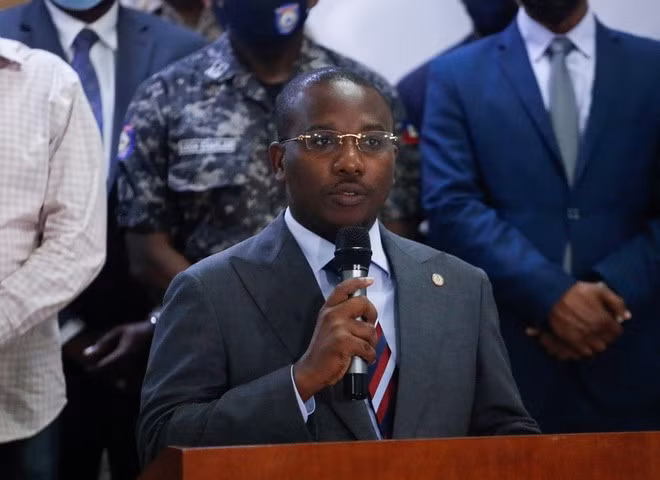Thủ tướng lâm thời của Haiti Claude Joseph phát biểu ở Port-au-Prince vào ngày 8/7, một ngày sau vụ ám sát Tổng thống Jovenel Moise. (Ảnh: Reuters)