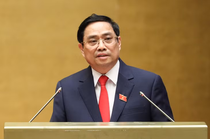 Thủ tướng Chính phủ Phạm Minh Chính trình bày Tờ trình về cơ cấu số lượng thành viên Chính phủ khóa XV - Ảnh: VGP/Nhật Bắc
