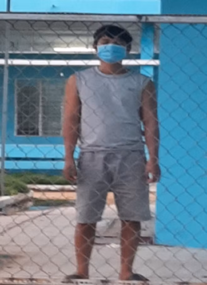 Lý Văn T. đang cách ly điều trị (Ảnh: Nghiêm Túc).