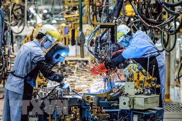 Standard Chartered ha du bao GDP cua Viet Nam xuong con 6,5% hinh anh 1