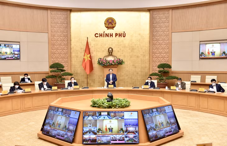 Thủ tướng Chính phủ Phạm Minh Chính, Trưởng Ban Chỉ đạo Quốc gia phòng chống dịch COVID-19 chủ trì cuộc họp của Ban Chỉ đạo sau hơn 1 tháng cả nước triển khai Nghị quyết 128 của Chính phủ quy định tạm thời về thích ứng an toàn, linh hoạt, kiểm soát hiệu quả dịch bệnh. Ảnh: VGP