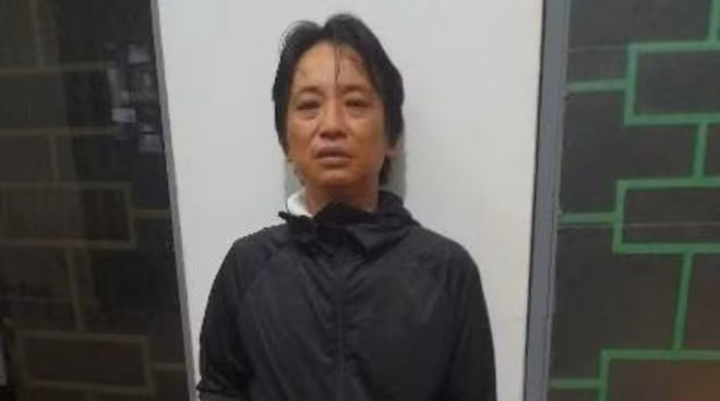 Tuấn Anh lấy xăng tưới để đốt người vợ hờ nhưng bất thành. Ảnh: CACC
