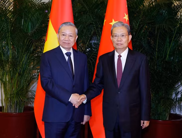 Tổng Bí thư, Chủ tịch nước Tô Lâm hội kiến Ủy viên trưởng Nhân đại toàn quốc Trung Quốc Triệu Lạc Tế. (Ảnh THỐNG NHẤT-TTXVN)
