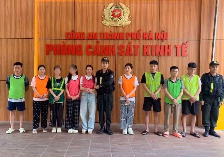 Các bị can tại cơ quan công an - Ảnh: Công an cung cấp