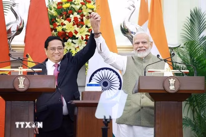 Thủ tướng Phạm Minh Chính và Thủ tướng Ấn Độ Narendra Modi tại cuộc gặp gỡ báo chí hai nước. (Ảnh: Dương Giang/TTXVN)
