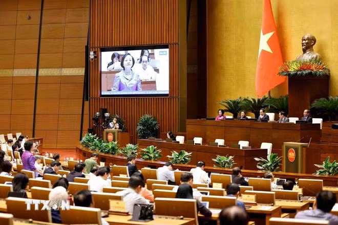 Bộ trưởng Bộ Nội vụ Phạm Thị Thanh Trà trả lời chất vấn. (Ảnh: Doãn Tấn/TTXVN)