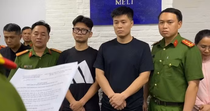 Cơ quan điều tra khám xét Công ty Meli Club - Ảnh: Công an TP.HCM