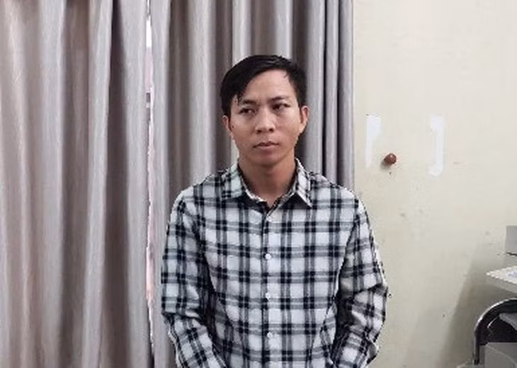 Lê Xuân Đào (cộng tác viên một tờ báo) tại cơ quan điều tra - Ảnh do công an cung cấp