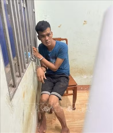 Đối tượng Kiên tại cơ quan công an. Ảnh: TTXVN phát