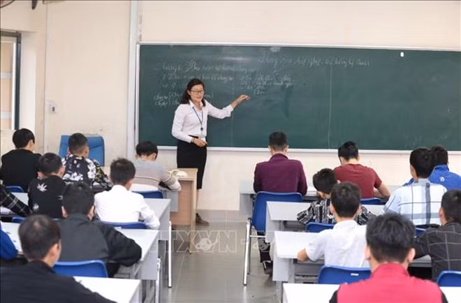 Giáo viên THCS hạng II xét thăng hạng lên chức danh nghề nghiệp hạng I cần đủ từ 6 năm trở lên. Ảnh minh họa: TTXVN.
