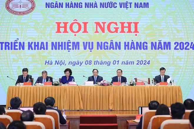 Thủ tướng Phạm Minh Chính dự Hội nghị triển khai nhiệm vụ ngành ngân hàng năm 2024. (Ảnh: Dương Giang/TTXVN)