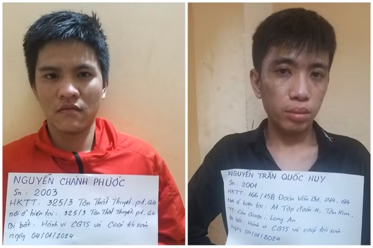 Hai đối tượng Nguyễn Chánh Phước và Nguyễn Trần Quốc Huy tại cơ quan điều tra.