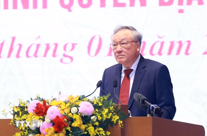 Phó Thủ tướng thường trực Nguyễn Hoà Bình trình bày báo cáo. (Ảnh: Dương Giang/TTXVN)
