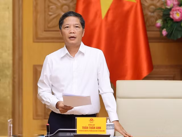 Ủy viên Bộ Chính trị, Trưởng Ban Kinh tế Trung ương Trần Tuấn Anh báo cáo về quá trình xây dựng Đề án - Ảnh: VGP/Nhật Bắc