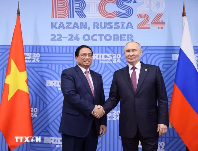 Thủ tướng Phạm Minh Chính với Tổng thống Liên bang Nga Vladimir Putin, Chủ tịch Nhóm BRICS năm 2024. (Ảnh: Dương Giang/TTXVN)