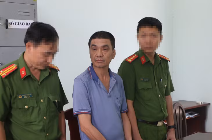 Bị can Nguyễn Tuấn Huynh khi bị bắt.