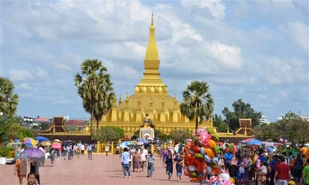 Viet Nam duoc uu tien dau tien khi Lao mo cua cho du khach quoc te hinh anh 1