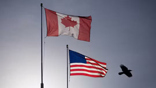 Quốc kỳ Canada và Mỹ. Ảnh minh hoạ: Getty Images