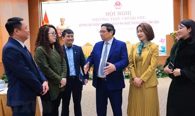 Thủ tướng Phạm Minh Chính với các đại biểu. (Ảnh: Dương Giang/TTXVN)