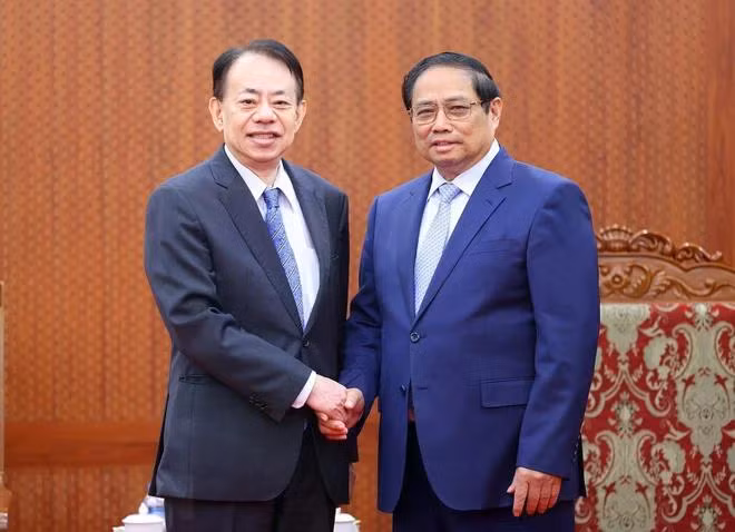 Thủ tướng Phạm Minh Chính tiếp Chủ tịch ADB Masatsugu Asakawa. (Ảnh: Dương Giang-TTXVN)