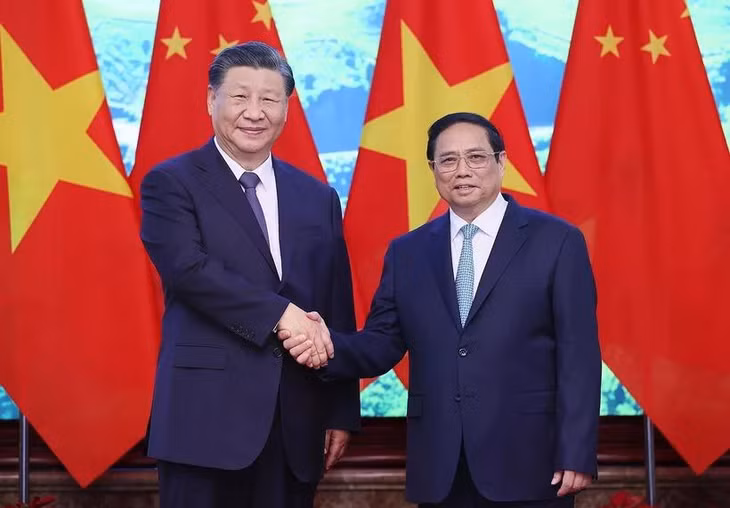 Thủ tướng Phạm Minh Chính và Tổng Bí thư, Chủ tịch nước Trung Quốc Tập Cận Bình chụp ảnh chung. (Ảnh: Dương Giang/TTXVN)
