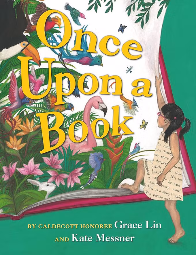 Vị trí thứ sáu là Once Upon A Book - sáng tác của Grace Lin và Kate Messner. Ảnh: Amazon Tác phẩm là thế giới tưởng tượng của Alice, khi cô bé nghĩ mình đang sống trong cuốn sách yêu thích. Mỗi trang được lật, cô bé lại đến một địa điểm như khu rừng nhiệt đời, sa mạc, rặng san hô, thậm chí bay lên bầu trời. Đi tới đâu, chiếc váy của Alice sẽ đổi màu, khiến cô bé như hòa nhập vào không gian ấy. Tuy nhiên cuối cùng, Alice vẫn khao khát một nơi ấm cúng, và cô đã trở về nhà với căn bếp "có mùi bánh bao".