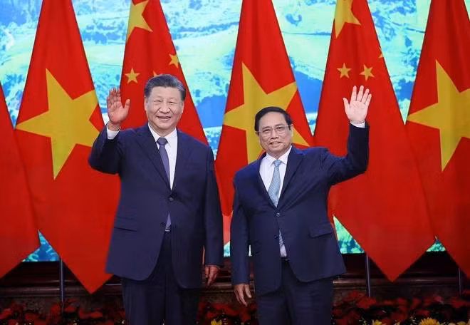Thủ tướng Phạm Minh Chính và Tổng Bí thư, Chủ tịch nước Trung Quốc Tập Cận Bình chụp ảnh chung. (Ảnh: Dương Giang/TTXVN)