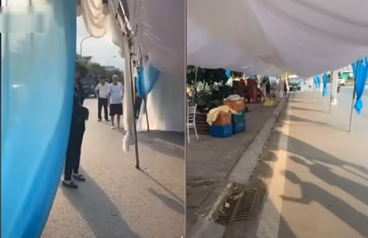 Người dân dựng rạp đám cưới lấn chiếm lòng đường, bị cơ quan chức năng yêu cầu phá dỡ. (Ảnh cắt từ clip đang lan truyền trên mạng xã hội)