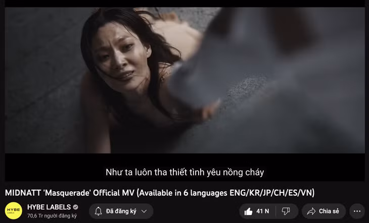 Ca khúc "Masquerade" có bản tiếng Việt do Hoàng Dũng viết lời, đăng trên kênh YouTube của HYBE (công ty sở hữu nhóm nhạc BTS) - Ảnh: Chụp màn hình